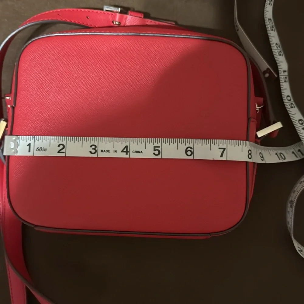 Kate Spade crossbody use only couple of tomes is in excellent condition.